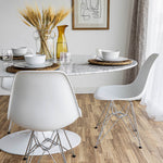Load image into Gallery viewer, Flute Oval Marble Top Dining Table-Condo Size by Style In Form. Lifestyle shot showing table in a dining room with 3 place settings 3 white chairs tucked under the table. Shop vintage &amp; new home décor, lighting &amp; home furnishings as well as novelty gifts &amp; pet accessories online at blueigloo.ca
