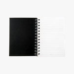 Load image into Gallery viewer, 5x7 Spiral B&amp;W Rectangles Journal. Top view of inside cover and first ruled page of journal shown. Shop a selection of notebooks &amp; journals at blueigloo.ca
