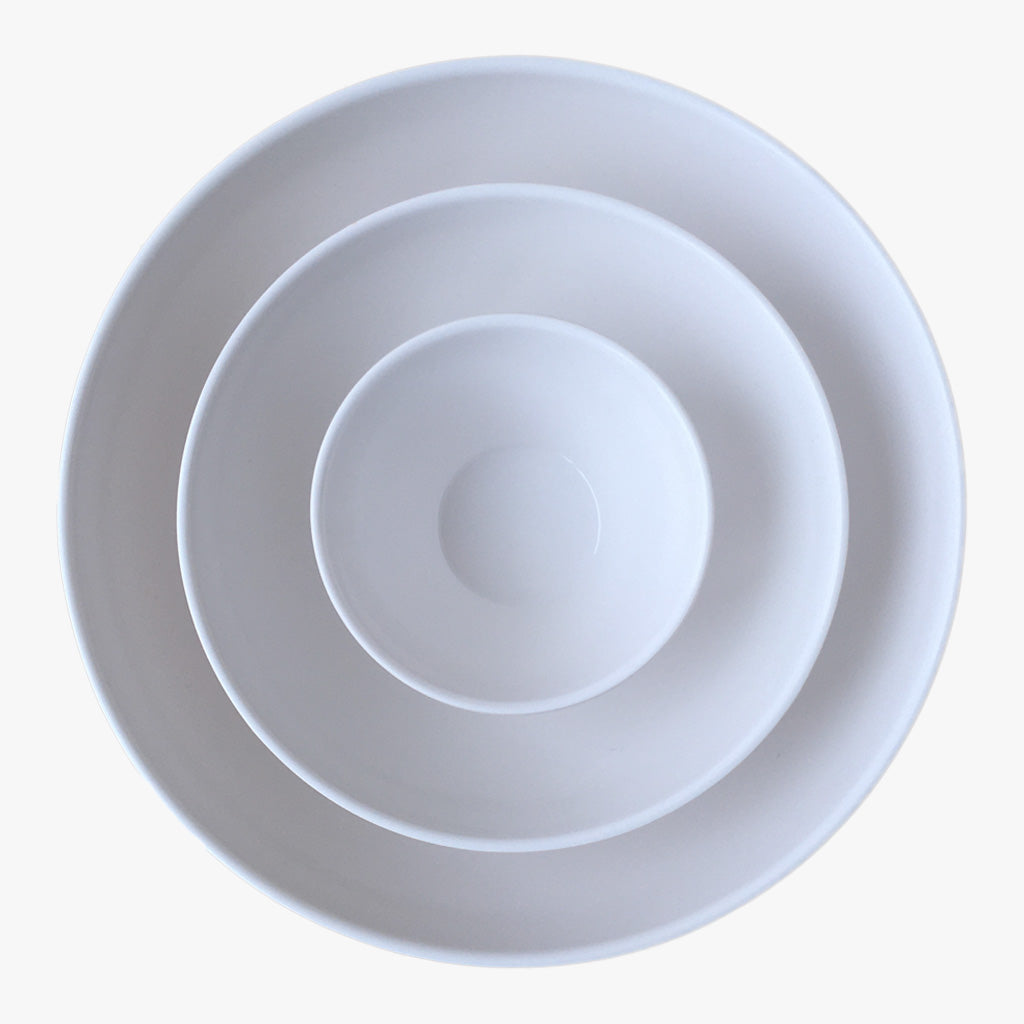 Amuse Bouche Nesting Bowl-Set 3. Top view of bowls nested in each other on an off white background. Shop decor, tabletop and serveware online at blueigloo.ca. 
