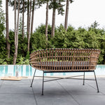 Load image into Gallery viewer, Calabria Bench by Style In Form. Shown in Natural / Black. Back view of bench on pool deck with pool and trees in the background. Shop vintage &amp; new home décor, lighting &amp; home furnishings as well as novelty gifts &amp; pet accessories online at blueigloo.ca
