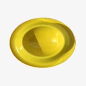 Chow Dog Bowl by UMBRA. Color: Yellow/Orange. Top view of bowl on off white backround. Shop vintage & new home décor, lighting & home furnishings as well as novelty gifts & pet accessories online at blueigloo.ca