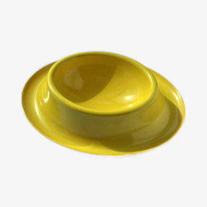 Chow Dog Bowl by UMBRA. Color: Yellow/Orange. Top side view of bowl on off white backround. Shop vintage & new home décor, lighting & home furnishings as well as novelty gifts & pet accessories online at blueigloo.ca