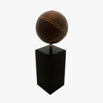 Load image into Gallery viewer, Leather Ball On Stand, Tall. Side view. Shown in brown. Shop a blend of vintage and new home décor, lighting and home furnishings as well as novelty gifts and pet accessories online at blueigloo.ca
