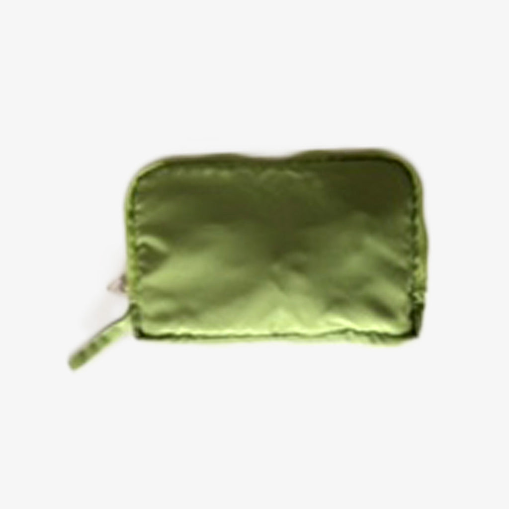 Rain Dog Jacket, Green. Top view showing jacket folded in closed pouch on an off white back ground. Shop vintage & new home décor, lighting & home furnishings as well as novelty gifts & pet accessories online at blueigloo.ca