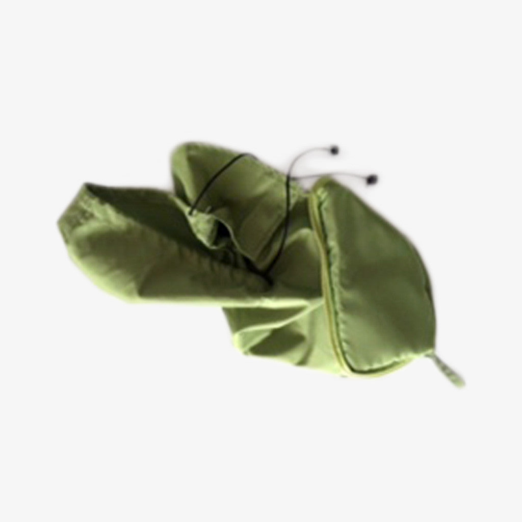 Rain Dog Jacket, Green. Top view showing jacket partially folded into pouch on an off white back ground. Shop vintage & new home décor, lighting & home furnishings as well as novelty gifts & pet accessories online at blueigloo.ca